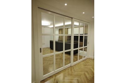 Puerta corredera acristalada